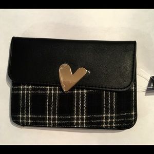 Mini Black crossbody bag with heart magnetic clasp